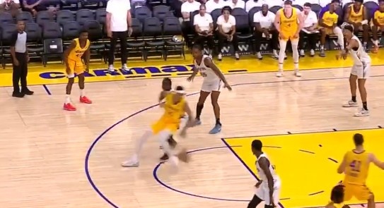 Move like a rabbit! Bazley plays a single with the ball on the top of the arc, turns around and kills the basket and takes off and glides with both hands.